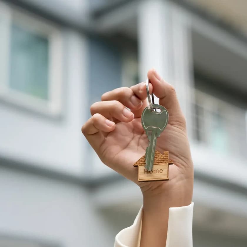 Renter holding keys to a new apartment